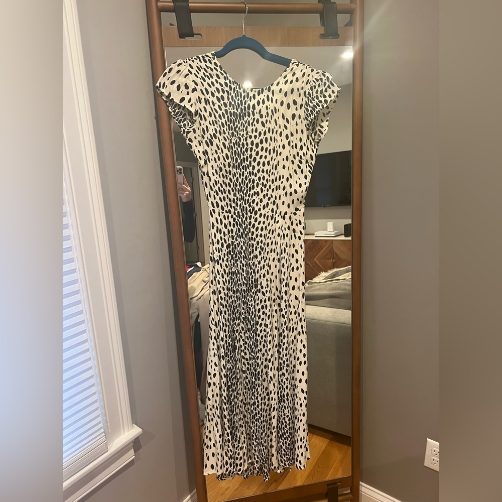 Wore once for a wedding! In Cheetah pattern. Like new :)